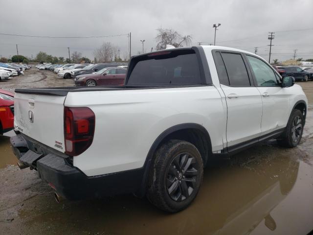 Photo 3 from auction – 2021 HONDA RIDGELINE with VIN 5FPYK3F13MB021891