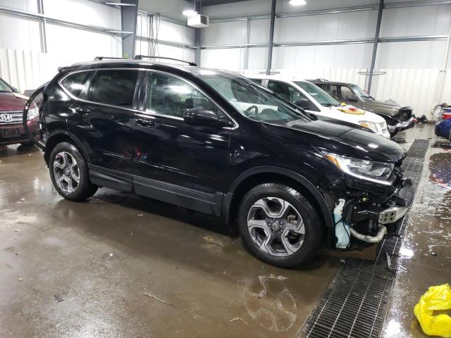 Photo 4 from auction – 2018 HONDA CR-V EXL with VIN 7FARW2H83JE004658