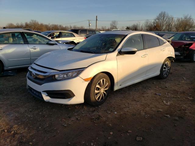 HONDA CIVIC LX 2018 with VIN 2HGFC2F59JH566429 - Photo from auction