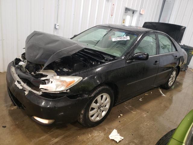 TOYOTA CAMRY LE 2003 with VIN 4T1BF30K43U058860 - Photo from auction