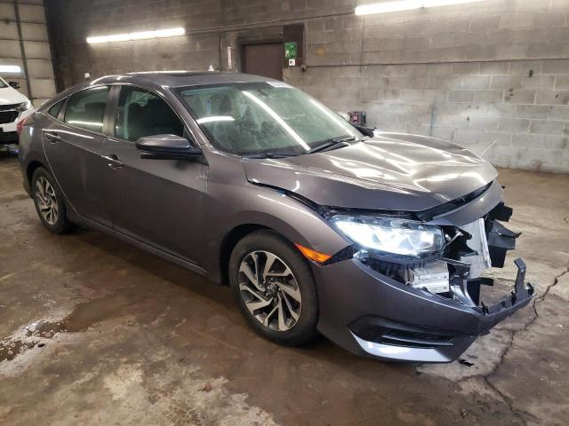 Photo 4 from auction – 2018 HONDA CIVIC EX with VIN 19XFC2F73JE203135