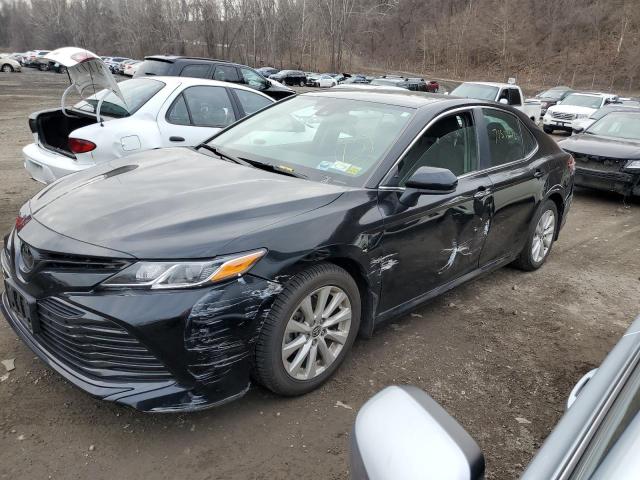 TOYOTA CAMRY LE 2020 with VIN 4T1C11AK2LU999410 - Photo from auction