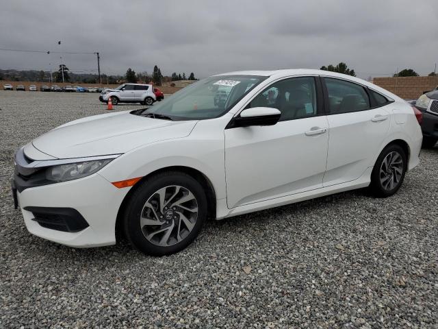 HONDA CIVIC EX 2017 with VIN 2HGFC2F73HH551565 - Photo from auction