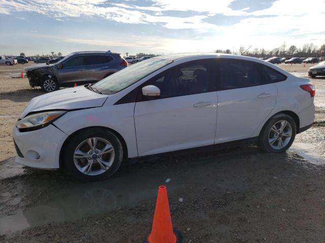 FORD FOCUS SE 2014 with VIN 1FADP3F21EL130212 - Photo from auction