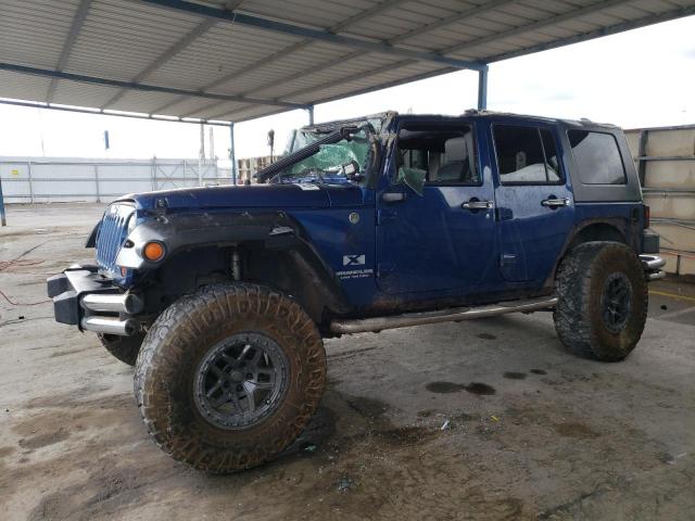 JEEP WRANGLER U 2009 with VIN 1J4GA391X9L719979 - Photo from auction