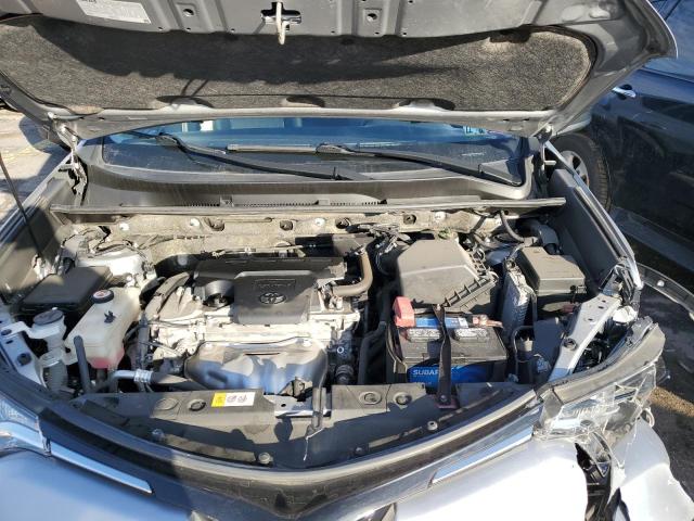 Photo 12 from auction – 2018 TOYOTA RAV4 LE with VIN JTMBFREV7JJ200529