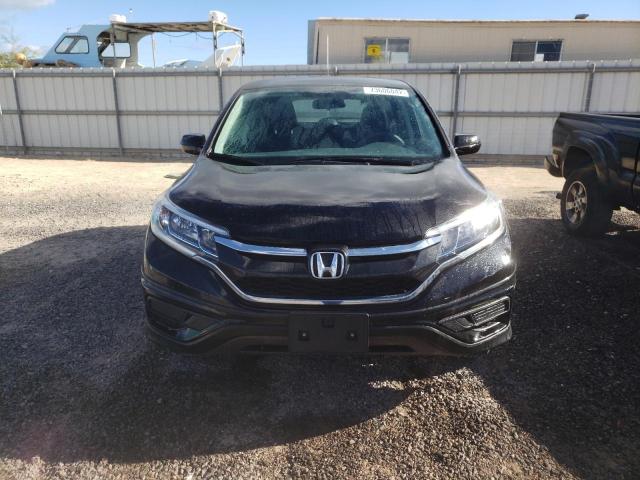 Photo 5 from auction – 2015 HONDA CR-V LX with VIN 2HKRM3H32FH507876