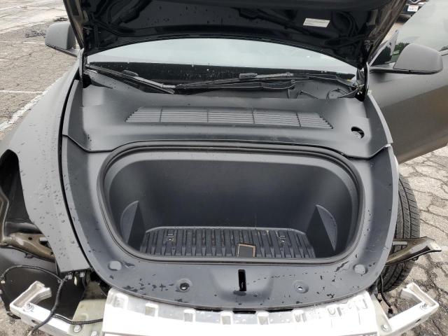 Photo 12 from auction – 2022 TESLA MODEL Y with VIN 7SAYGDEFXNF552863