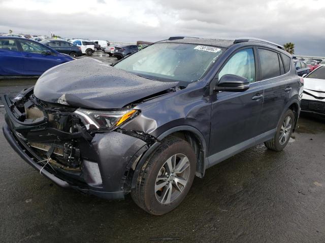 TOYOTA RAV4 XLE 2016 with VIN 2T3WFREV6GW250656 - Photo from auction