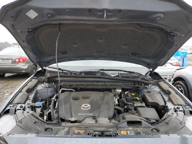 Photo 11 from auction – 2021 MAZDA CX-5 TOURI with VIN JM3KFACM4M0387774