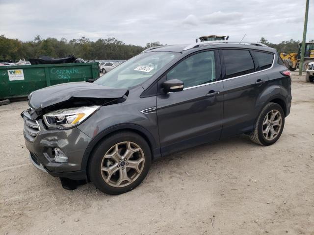 FORD ESCAPE TIT 2017 with VIN 1FMCU0J96HUD72828 - Photo from auction