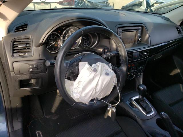 Photo 8 from auction – 2015 MAZDA CX-5 TOURI with VIN JM3KE2CY2F0520689