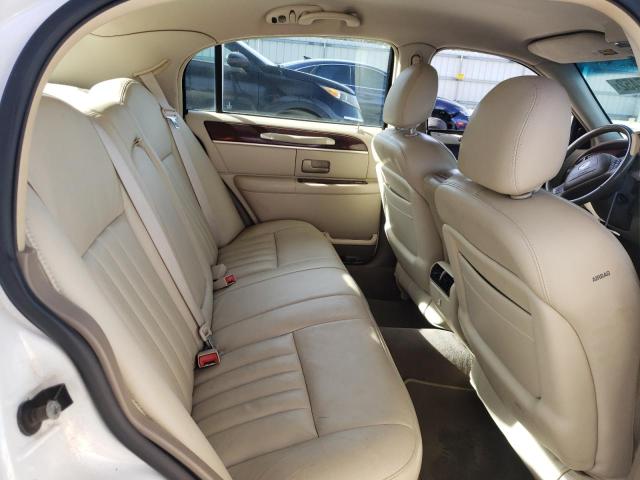 Photo 10 from auction – 2004 LINCOLN TOWN CAR E with VIN 1LNHM81W14Y661922