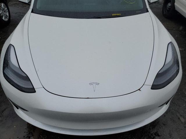 Photo 11 from auction – 2021 TESLA MODEL 3 with VIN 5YJ3E1EA1MF027348