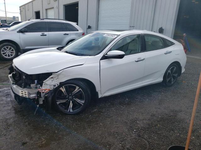 HONDA CIVIC TOUR 2017 with VIN 19XFC1F96HE020091 - Photo from auction