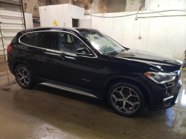 Photo 4 from auction – 2016 BMW X1 XDRIVE2 with VIN WBXHT3C3XGP881067