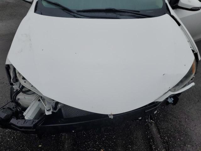 Photo 11 from auction – 2014 TOYOTA COROLLA L with VIN 5YFBURHE3EP006681