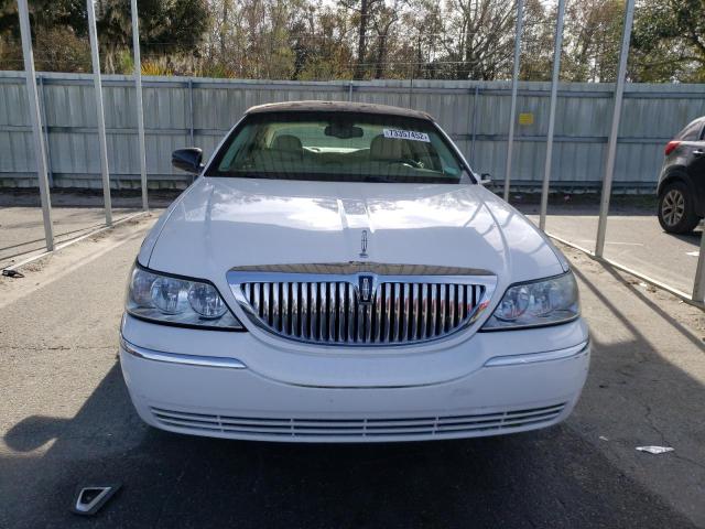Photo 5 from auction – 2004 LINCOLN TOWN CAR E with VIN 1LNHM81W14Y661922