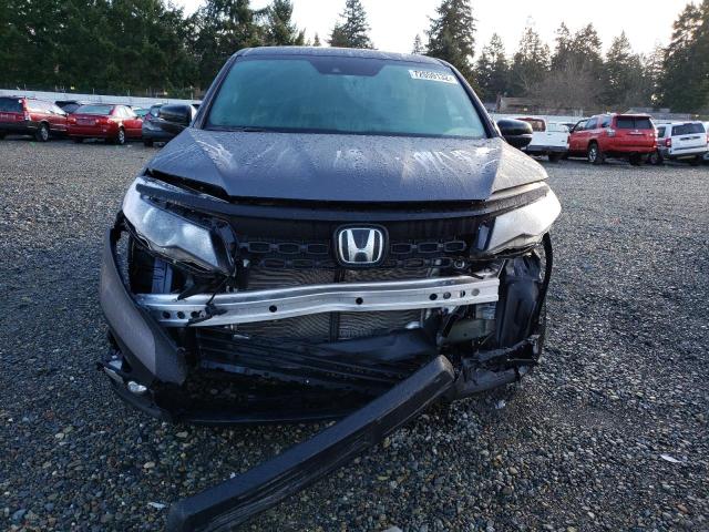 Photo 5 from auction – 2021 HONDA PASSPORT E with VIN 5FNYF8H50MB035595
