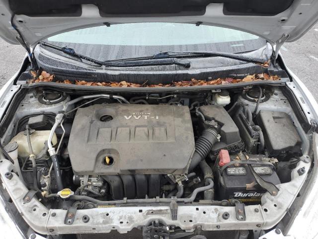 Photo 11 from auction – 2009 TOYOTA COROLLA MA with VIN 2T1KU40EX9C099090