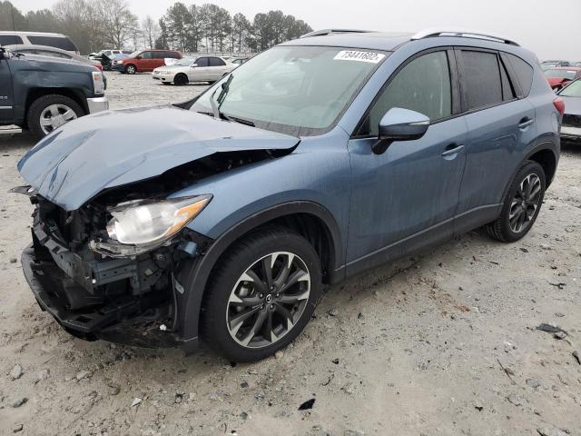 MAZDA CX-5 GT 2016 with VIN JM3KE2DY5G0802907 - Photo from auction