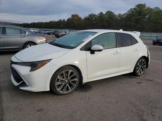 TOYOTA COROLLA SE 2019 with VIN JTNK4RBE0K3051697 - Photo from auction