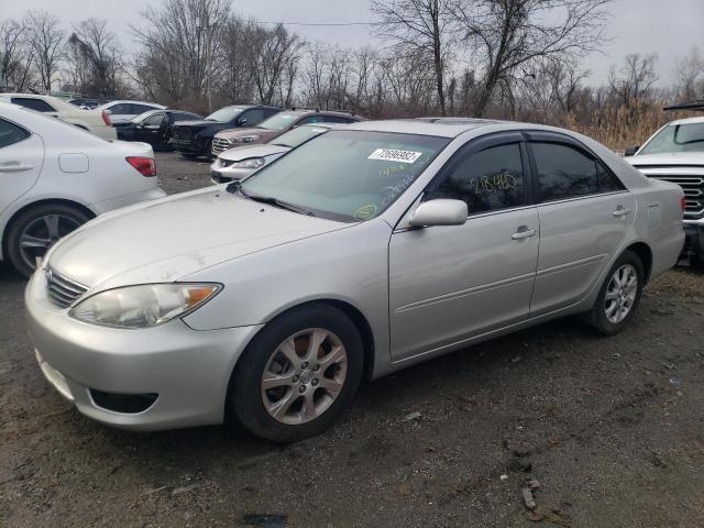 TOYOTA CAMRY LE 2005 with VIN 4T1BF30K75U087966 - Photo from auction