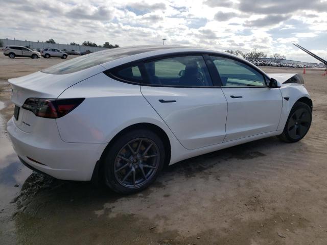 Photo 3 from auction – 2022 TESLA MODEL 3 with VIN 5YJ3E1EB1NF104584