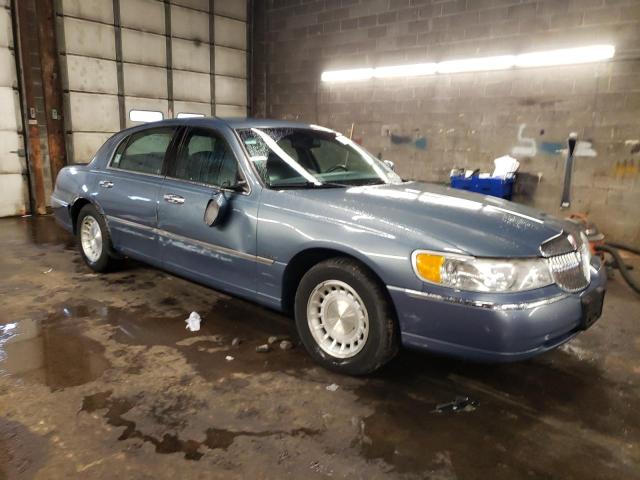 Photo 4 from auction – 2000 LINCOLN TOWN CAR E with VIN 1LNHM81W0YY869165