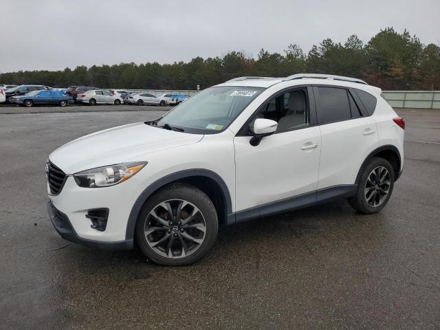 MAZDA CX-5 GT 2016 with VIN JM3KE4DY5G0606543 - Photo from auction