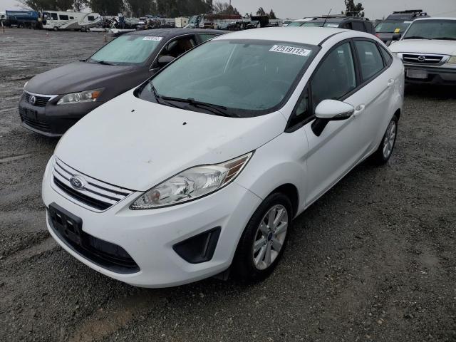 FORD FIESTA SE 2013 with VIN 3FADP4BJ9DM141202 - Photo from auction