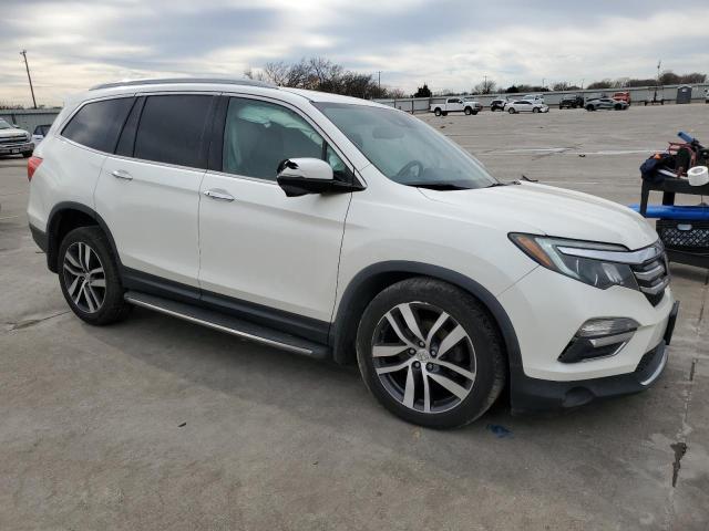 Photo 4 from auction – 2017 HONDA PILOT TOUR with VIN 5FNYF6H96HB040863