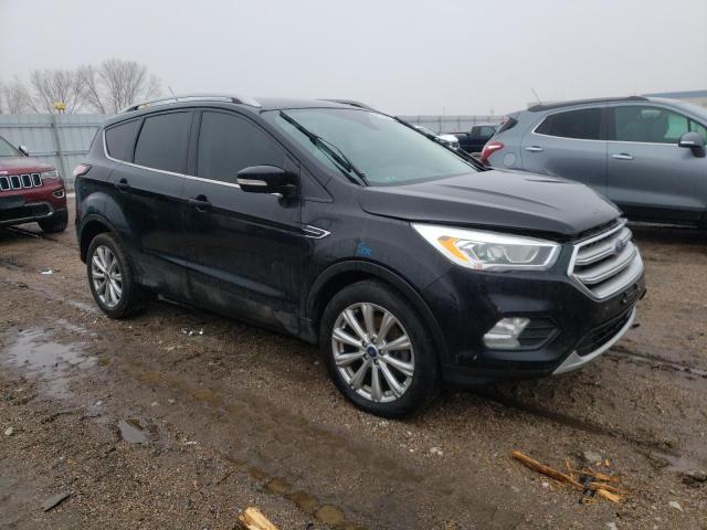Photo 4 from auction – 2017 FORD ESCAPE TIT with VIN 1FMCU9JD8HUD74850