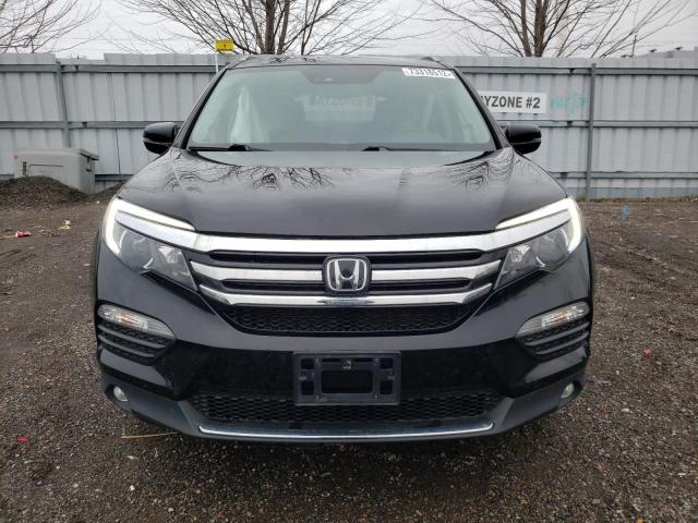 Photo 5 from auction – 2018 HONDA PILOT TOUR with VIN 5FNYF6H9XJB500256