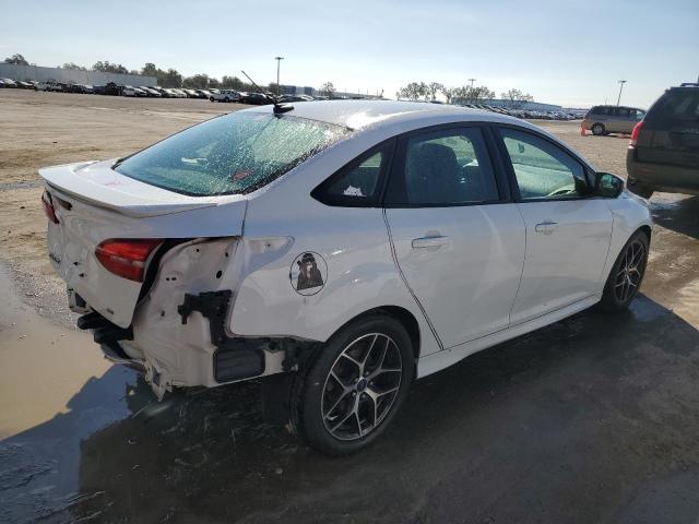 Photo 3 from auction – 2015 FORD FOCUS SE with VIN 1FADP3F23FL209382