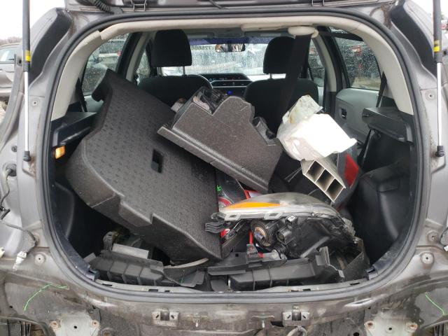 Photo 12 from auction – 2014 TOYOTA PRIUS C with VIN JTDKDTB3XE1074968