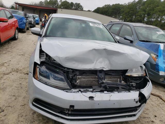 Photo 5 from auction – 2017 VOLKSWAGEN JETTA S with VIN 3VW2B7AJ6HM233115