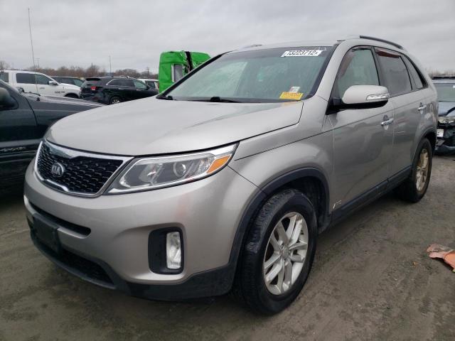 KIA SORENTO LX 2014 with VIN 5XYKTCA62EG471007 - Photo from auction