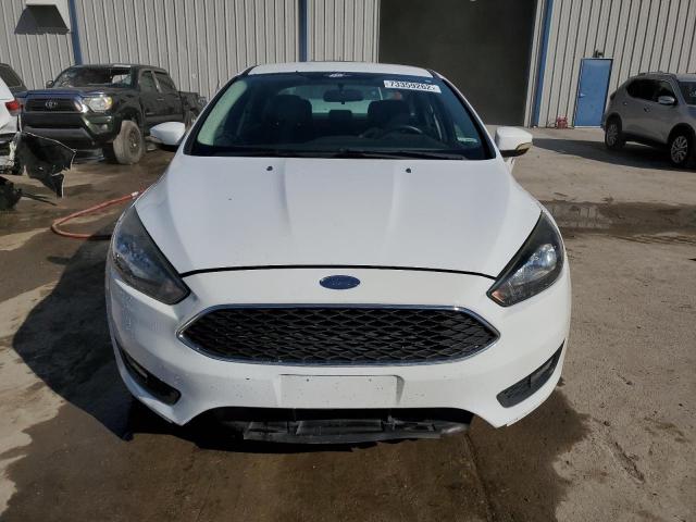 Photo 5 from auction – 2015 FORD FOCUS SE with VIN 1FADP3F23FL209382
