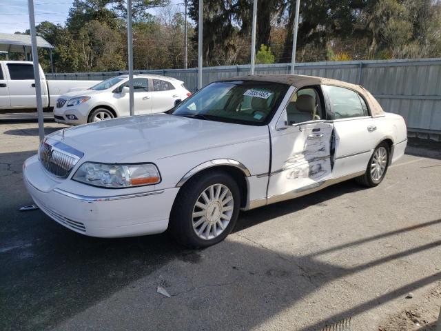 LINCOLN TOWN CAR E 2004 with VIN 1LNHM81W14Y661922 - Photo from auction