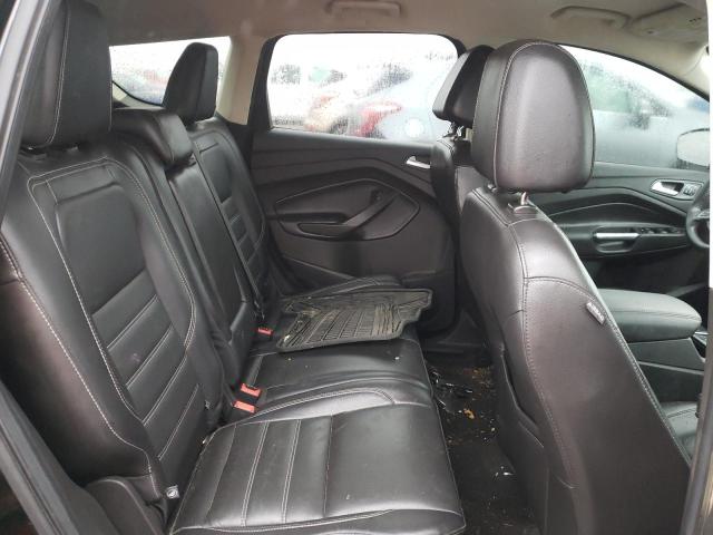 Photo 11 from auction – 2017 FORD ESCAPE TIT with VIN 1FMCU9JD8HUD74850