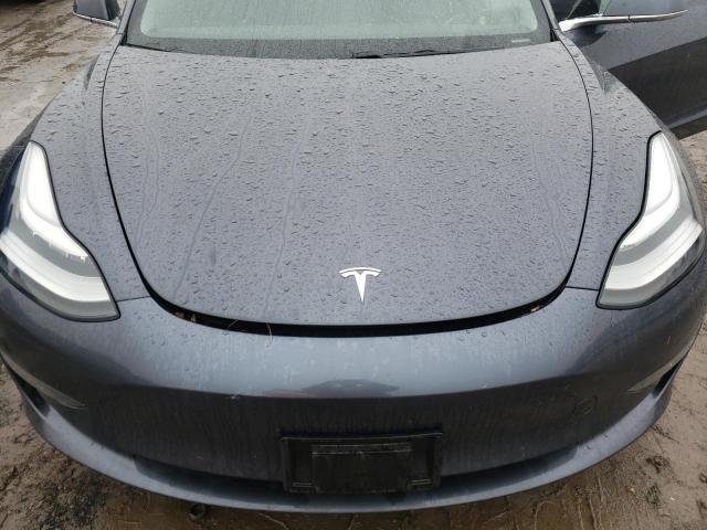 Photo 11 from auction – 2019 TESLA MODEL 3 with VIN 5YJ3E1EA9KF401931