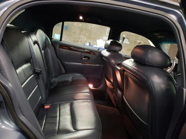 Photo 10 from auction – 2000 LINCOLN TOWN CAR E with VIN 1LNHM81W0YY869165