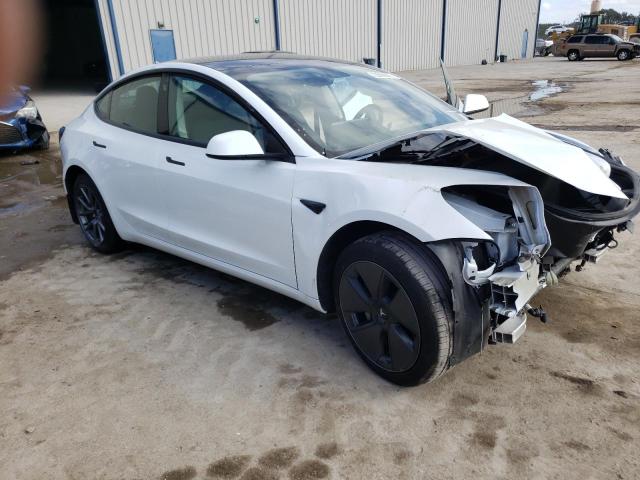 Photo 4 from auction – 2022 TESLA MODEL 3 with VIN 5YJ3E1EB1NF104584