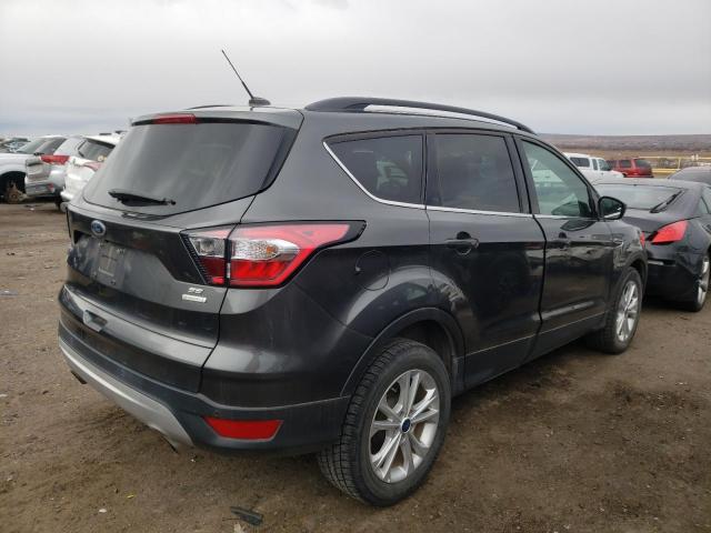 Photo 3 from auction – 2018 FORD ESCAPE SE with VIN 1FMCU0GD1JUC95108