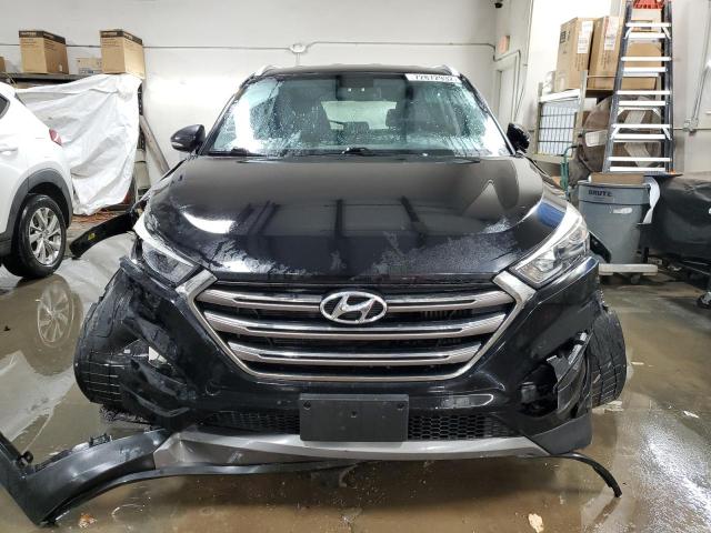 Photo 5 from auction – 2016 HYUNDAI TUCSON LIM with VIN KM8J33A24GU266763