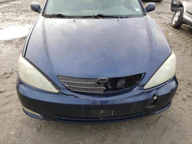 Photo 11 from auction – 2004 TOYOTA CAMRY LE with VIN 4T1BE30K34U299023