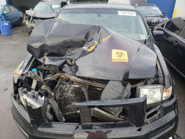 Photo 11 from auction – 2006 HONDA RIDGELINE with VIN 2HJYK16546H516304