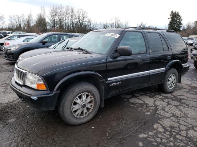 GMC JIMMY 2001 with VIN 1GKDT13W712117079 - Photo from auction