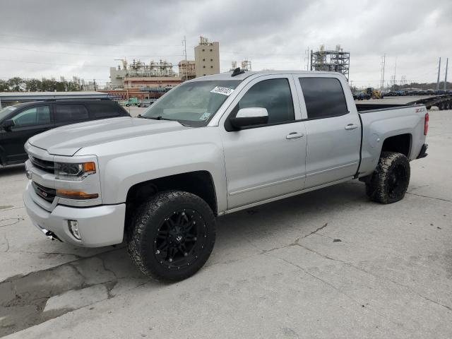 CHEVROLET SILVERADO 2018 with VIN 3GCUKREC8JG215979 - Photo from auction